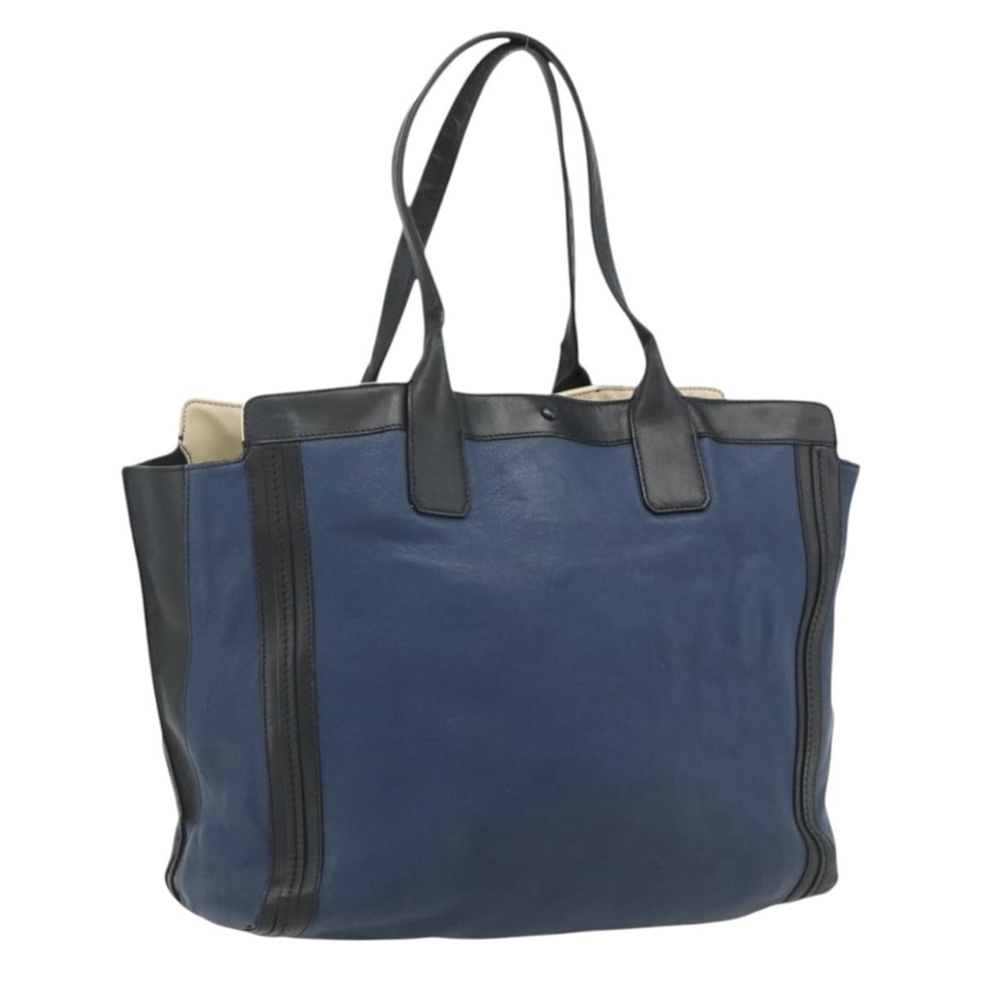Chloe Navy Leather Tote Bag with Gold Tone Hardware: Chloe Navy Leather Tote Bag with Gold Tone Hardware Chloe tote bag in navy and gold leather, made in Hungary. This women's tote bag has an approximate size of 37 cm W x 30 cm H x 17 cm D, with an appr