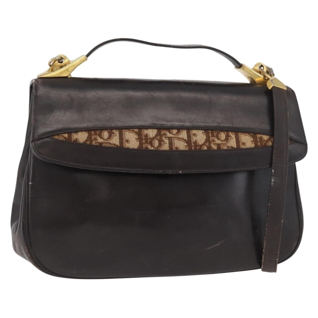 Christian Dior dark brown leather 2way handbag with shoulder strap and pouch: Christian Dior dark brown leather 2way handbag with shoulder strap and pouch This Christian Dior handbag is crafted from leather in a dark brown and gold color scheme. Designed for versatility, it can