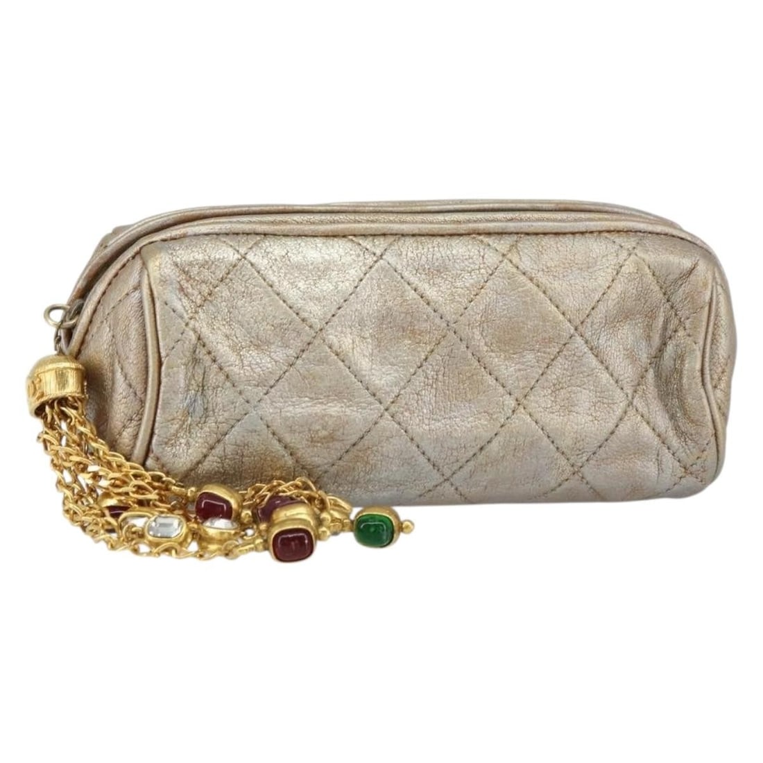 CHANEL CC Leather Pouch in Champagne Gold Matelasse: CHANEL CC Leather Pouch in Champagne Gold Matelasse CHANEL Matelasse pouch in leather with a Champagne Gold exterior. Made in Italy, this women's pouch measures approximately 16 cm wide, 7 cm high, an