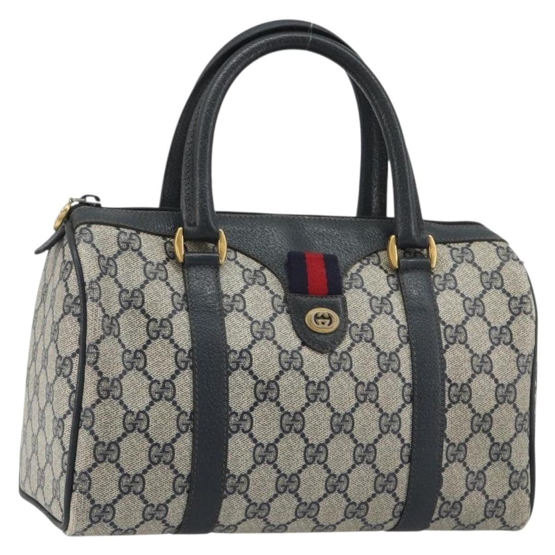 Gucci Boston Bag GG Supreme PVC Leather Navy Gold Sherry Line: Gucci Boston Bag GG Supreme PVC Leather Navy Gold Sherry Line This Gucci Sherry Line Boston Bag is crafted from PVC leather and GG canvas in a navy and gold colorway. Made in Italy, it features a Bost