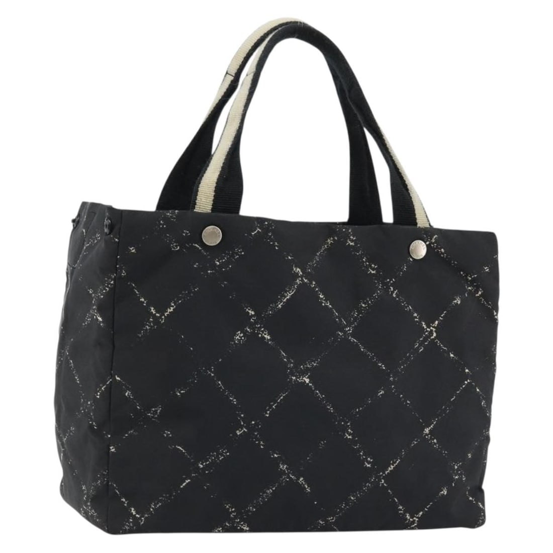 CHANEL New Travel Line Black Nylon Tote Hand Bag CC: CHANEL New Travel Line Black Nylon Tote Hand Bag CC This CHANEL New Travel Line hand bag is crafted in black nylon and made in France. It features a structured silhouette with a handle drop of approxi