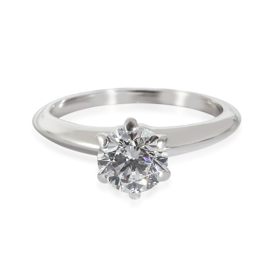 1.05 Carat Round Diamond Platinum Engagement Ring With Tiffany Certificate: 1.05 Carat Round Diamond Platinum Engagement Ring With Tiffany Certificate This Tiffany & Co. engagement ring features a 1.05 carat round brilliant diamond as its centerpiece. The diamond is graded IF