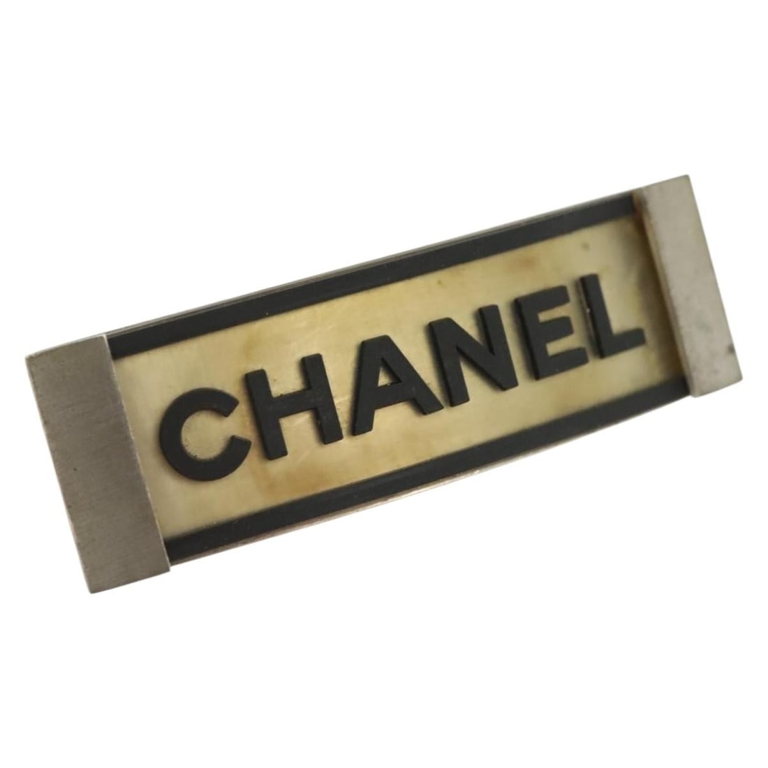 CHANEL Black Silver Metal Hair Clip Authentic Made in France: CHANEL Black Silver Metal Hair Clip Authentic Made in France This CHANEL hair clip is a stylish accessory that combines elegance with functionality. Crafted from durable metal, it features a sleek bla