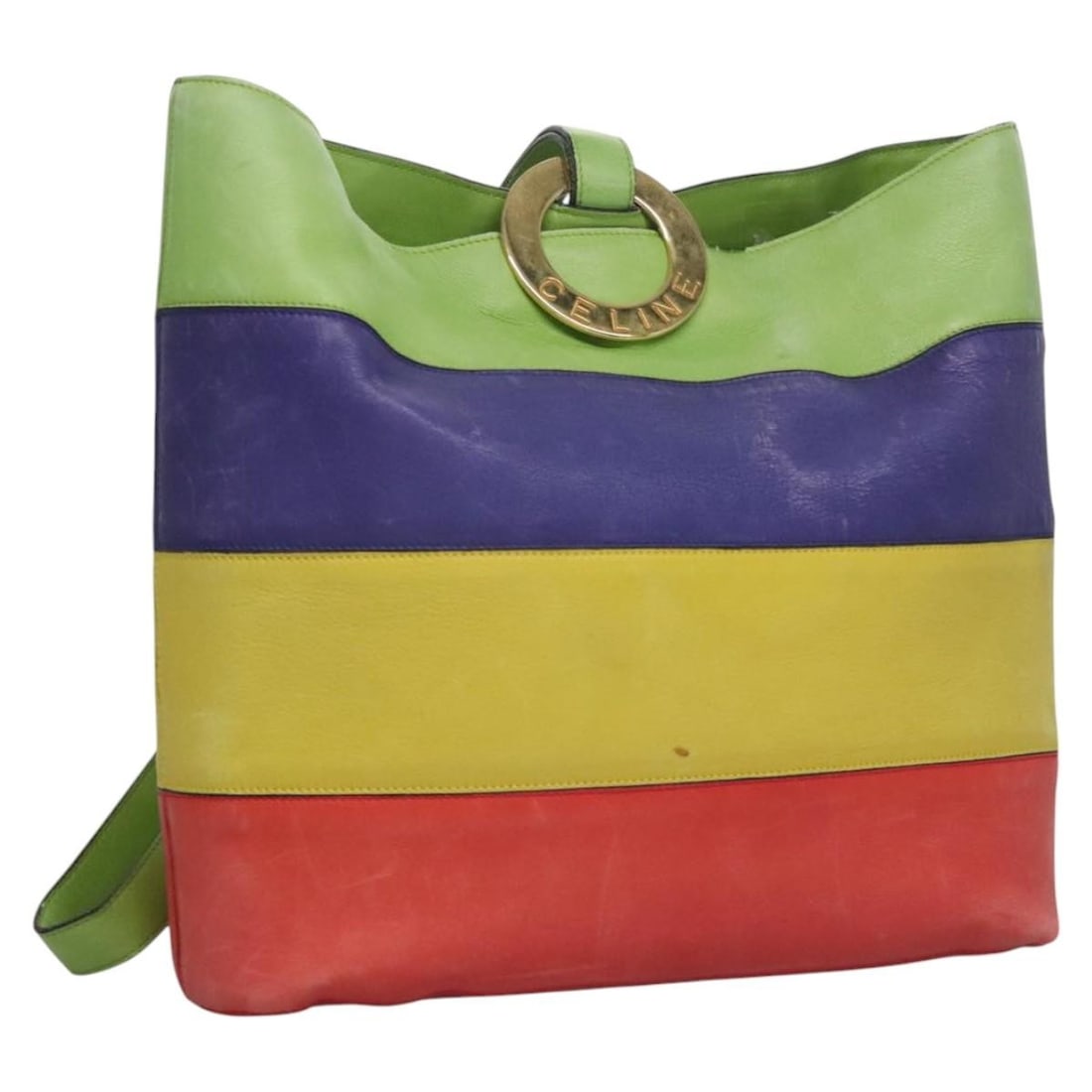 CELINE Leather Shoulder Bag Green Red Yellow Italy: CELINE Leather Shoulder Bag Green Red Yellow Italy This CELINE shoulder bag is crafted from leather in green, red, and yellow. Made in Italy, it features a shoulder drop of 45 cm and measures approxim