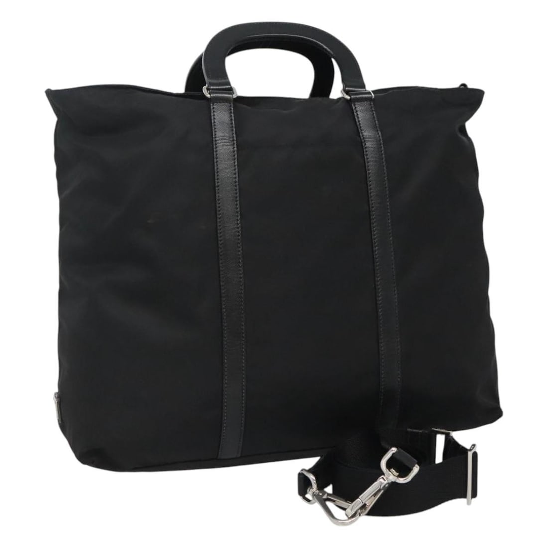 Prada Black Nylon 2way Handbag with Shoulder Strap and Card: Prada Black Nylon 2way Handbag with Shoulder Strap and Card Black Prada nylon hand bag in a 2-way style, made in Italy. It comes with a shoulder strap and guarantee card. The bag shows signs of heavy 
