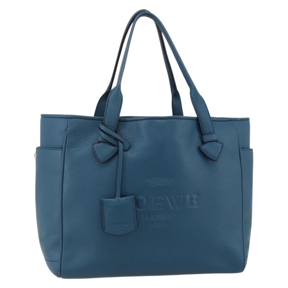 LOEWE Heritage Leather Tote in Gold and Blue: LOEWE Heritage Leather Tote in Gold and Blue LOEWE Heritage tote bag in leather with a gold and blue exterior. Made in Spain, this women's tote bag measures approximately 11.0 x 9.8 x 4.7 inches with 