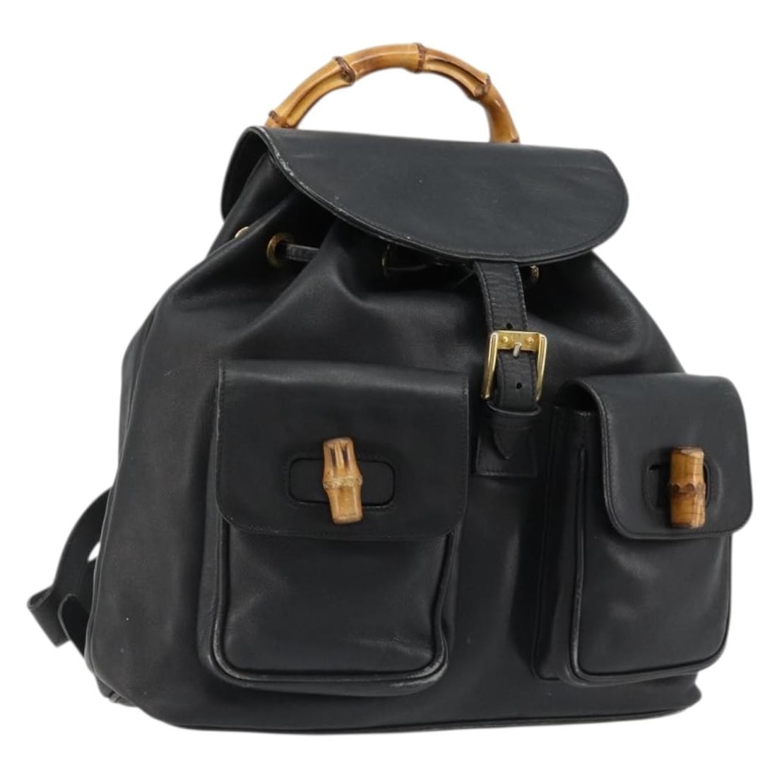 Gucci 003 2058 0016 Black Leather Bamboo Backpack: Gucci 003 2058 0016 Black Leather Bamboo Backpack Gucci bamboo backpack in black leather with gold-tone accents. This women's backpack is made in Italy and shows heavy use, including loss of shape, ru