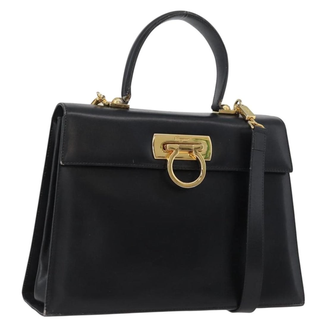 Salvatore Ferragamo Black Gold Leather Gancini 2way Handbag with Strap: Salvatore Ferragamo Black Gold Leather Gancini 2way Handbag with Strap This Salvatore Ferragamo Gancini handbag is crafted from black leather with gold-tone accents. Designed as a 2-way bag, it can be