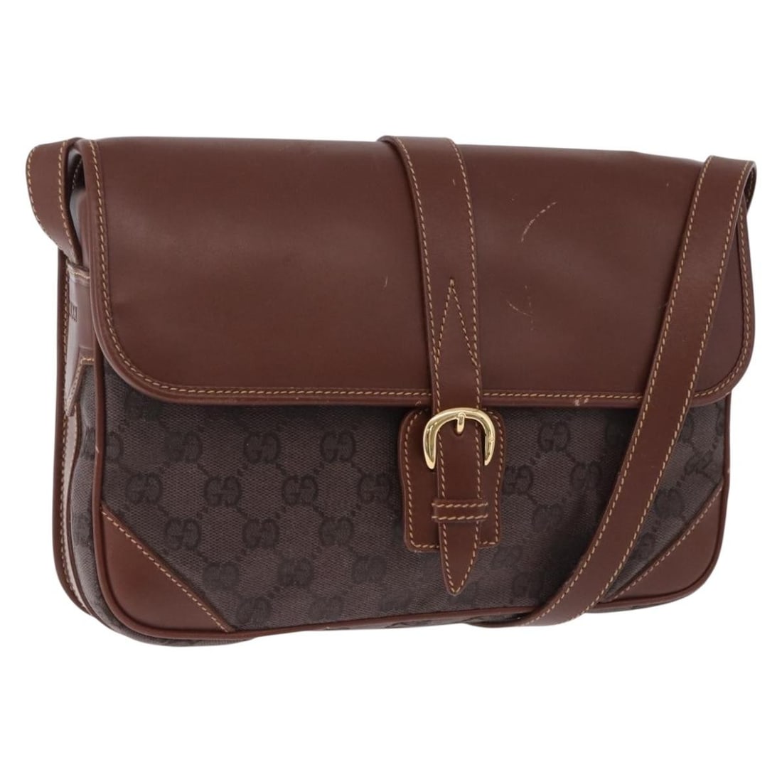Gucci 001 261 0613 GG Canvas Brown Shoulder Bag with Dust Bag: Gucci 001 261 0613 GG Canvas Brown Shoulder Bag with Dust Bag A Gucci shoulder bag in brown and gold GG canvas, made in Italy. It measures approximately W27 cm x H19 cm x D7 cm, with a shoulder drop o