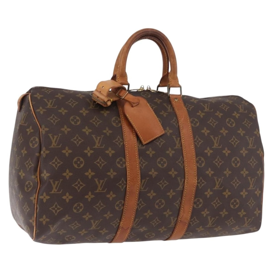 Louis Vuitton M41428 Keepall 45 Monogram Canvas Boston Bag: Louis Vuitton M41428 Keepall 45 Monogram Canvas Boston Bag A Louis Vuitton Keepall 45 Boston bag in Monogram canvas, made in France. It comes with a name tag and powanie accessory. The bag is identifi