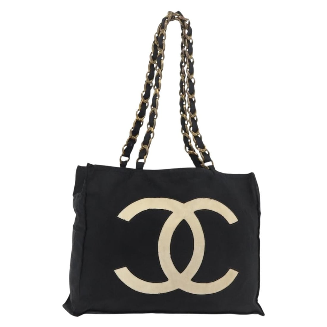 CHANEL CC Chain Tote Bag in Black Nylon with Gold Tone: CHANEL CC Chain Tote Bag in Black Nylon with Gold Tone Chanel Coco Mark chain tote bag in black nylon with gold-tone accents. This women's tote is made in Italy and shows heavy use, including shape lo