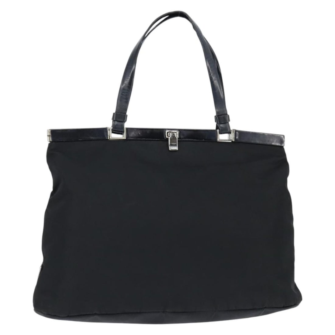Prada black nylon women s tote bag Italy silver trim: Prada black nylon women s tote bag Italy silver trim This PRADA hand bag is crafted from black nylon with silver-tone accents and was made in Italy. It features a spacious interior, dual handles, and 