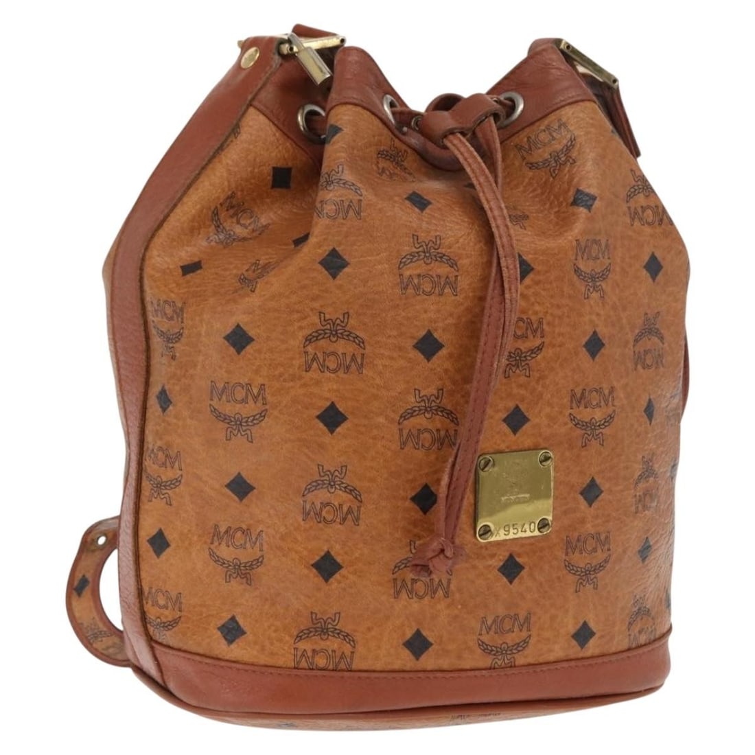 MCM Vicetos Brown PVC Shoulder Bag with Gold Accents and Padlock: MCM Vicetos Brown PVC Shoulder Bag with Gold Accents and Padlock This MCM Vicetos Logogram shoulder bag features a brown and gold PVC leather exterior with gold-tone accents. The bag is equipped with 