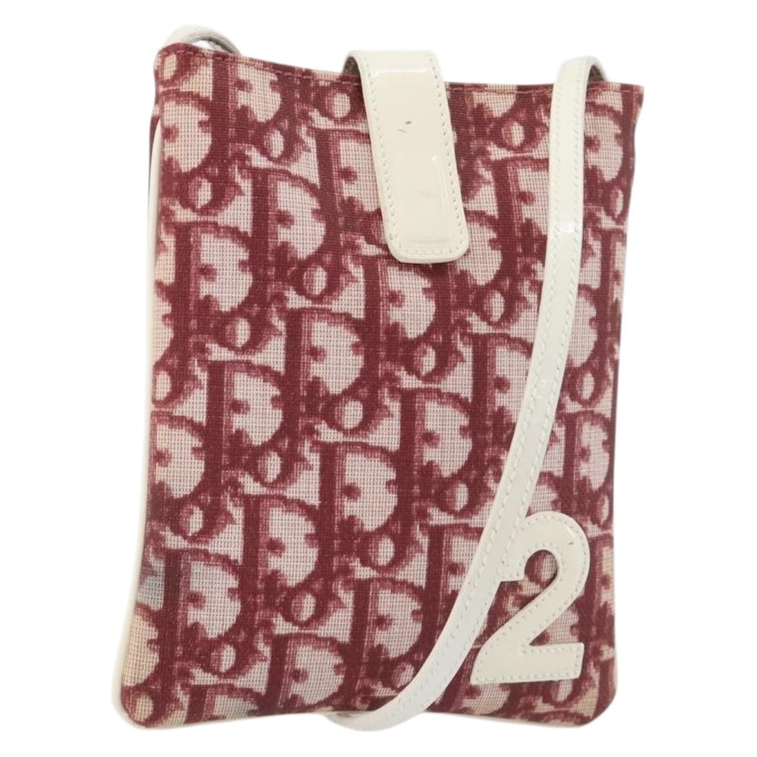 Red PVC Leather Trotter Canvas Shoulder Bag Christian Dior: Red PVC Leather Trotter Canvas Shoulder Bag Christian Dior A Christian Dior Trotter canvas shoulder bag in red, made from PVC leather and Trotter canvas. It is a shoulder bag made in Italy with a shou