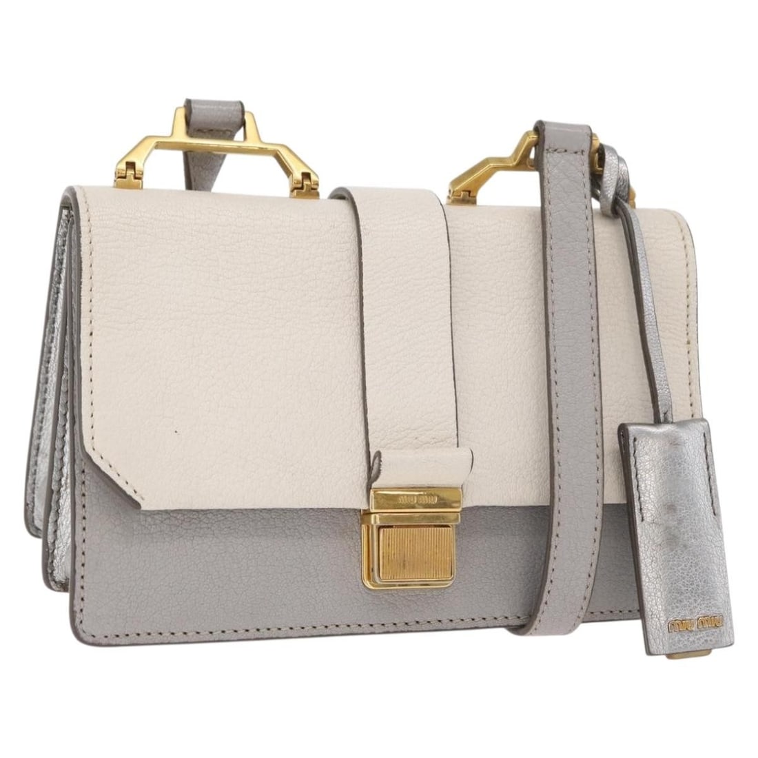 Miu Miu Gray Leather Shoulder Bag Gold Tone Made in Italy: Miu Miu Gray Leather Shoulder Bag Gold Tone Made in Italy Miu Miu shoulder bag in leather with a gray and gold color scheme. Made in Italy, this women's bag measures approximately 20 cm wide, 13 cm hi