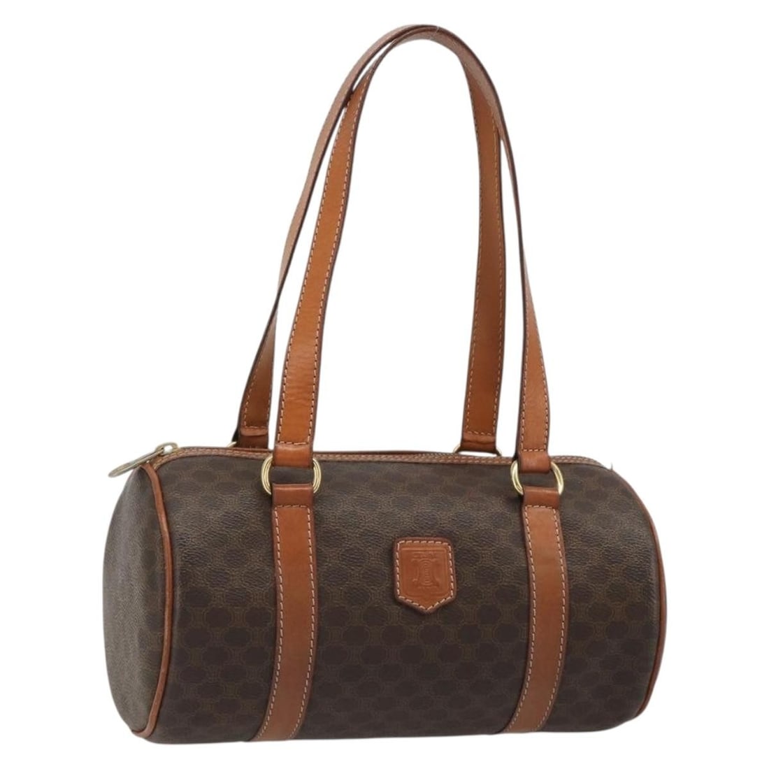 CELINE Macadam Canvas Brown Handbag Italy: CELINE Macadam Canvas Brown Handbag Italy CELINE Macadam Canvas hand bag in brown, made in Italy. The bag is crafted from Macadam Canvas and features a compact structure with an approximate handle len