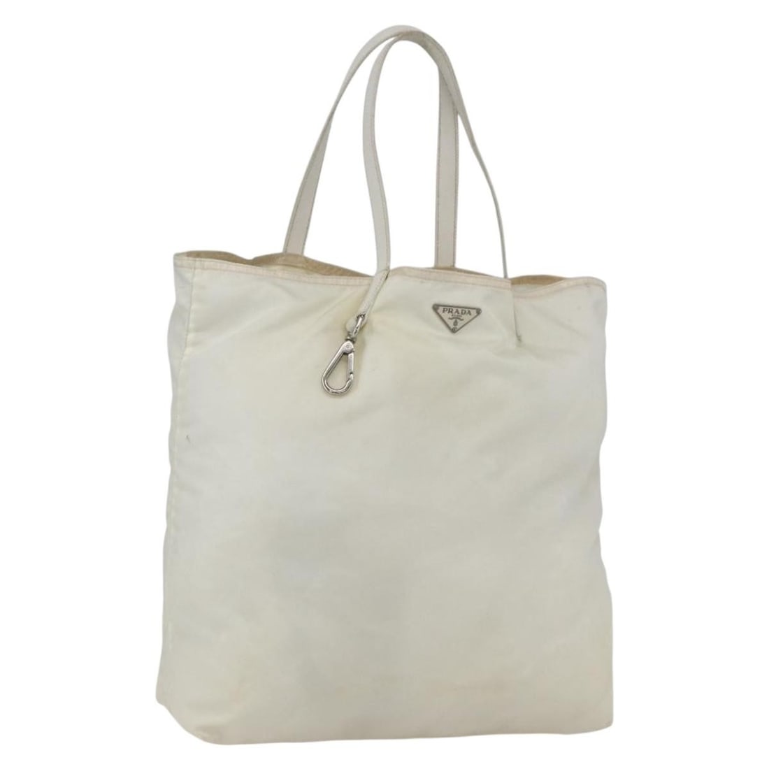 Prada White Silver Nylon Women Tote Bag Italy: Prada White Silver Nylon Women Tote Bag Italy This PRADA tote bag is crafted from white and silver nylon and features a spacious design ideal for everyday use. Made in Italy, it offers a handle drop f