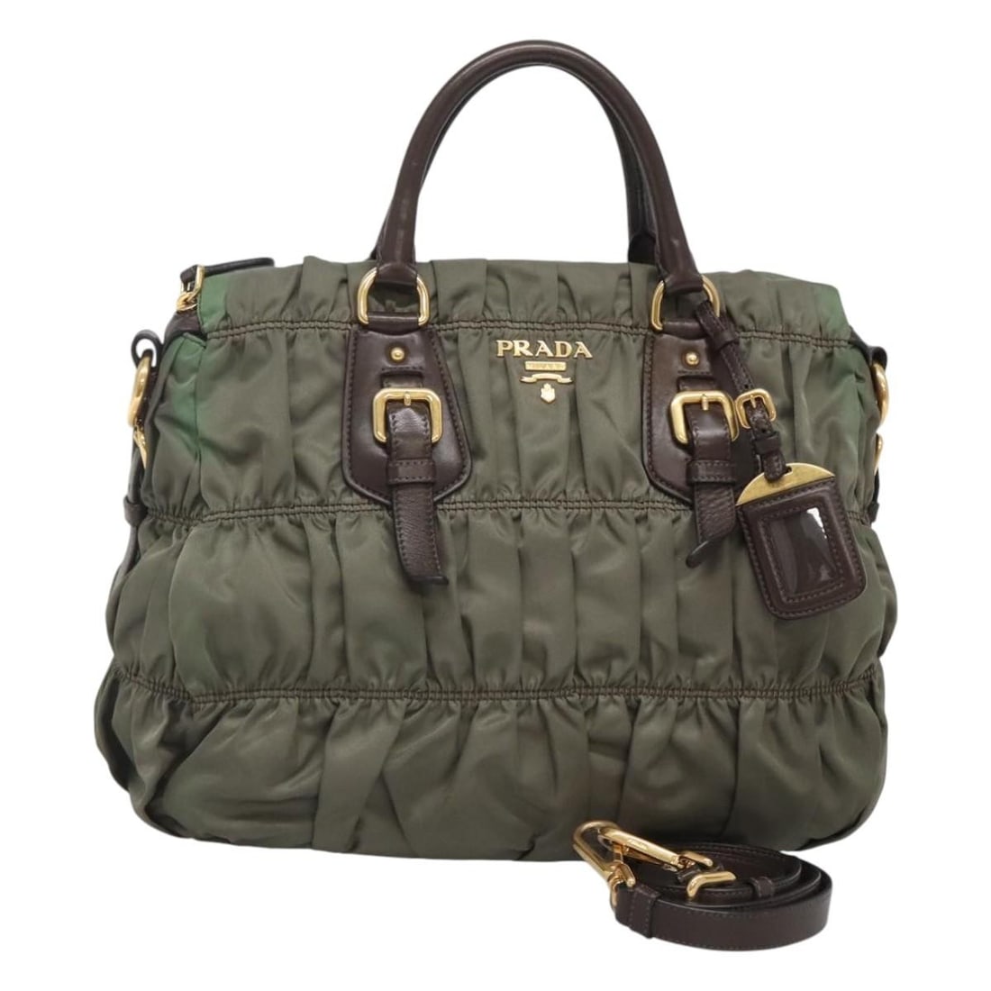 PRADA BD1244 Nylon 2 Way Handbag Khaki Gold with Strap: PRADA BD1244 Nylon 2 Way Handbag Khaki Gold with Strap PRADA hand bag in nylon with a khaki and gold color combination, made in Italy. It comes with a shoulder strap and name tag accessory. The bag is