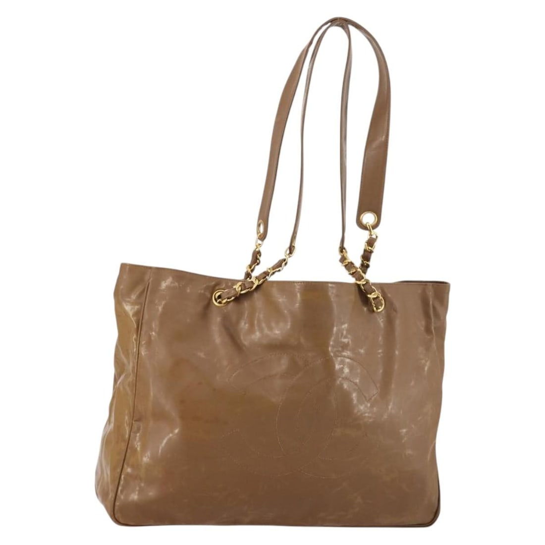 CHANEL Brown Enamel Tote Bag with Gold CC Made in Italy: CHANEL Brown Enamel Tote Bag with Gold CC Made in Italy Chanel tote bag in brown and gold enamel with double handles. Made in Italy, this women's bag shows heavy use with visible wear throughout, incl