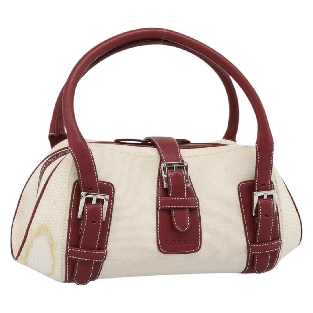 LOEWE beige canvas handbag silver tone made in Spain: LOEWE beige canvas handbag silver tone made in Spain A LOEWE handbag in beige and silver canvas, made in Spain. The bag measures approximately W33 x H16 x D10 cm, with a handle drop of approximately 1