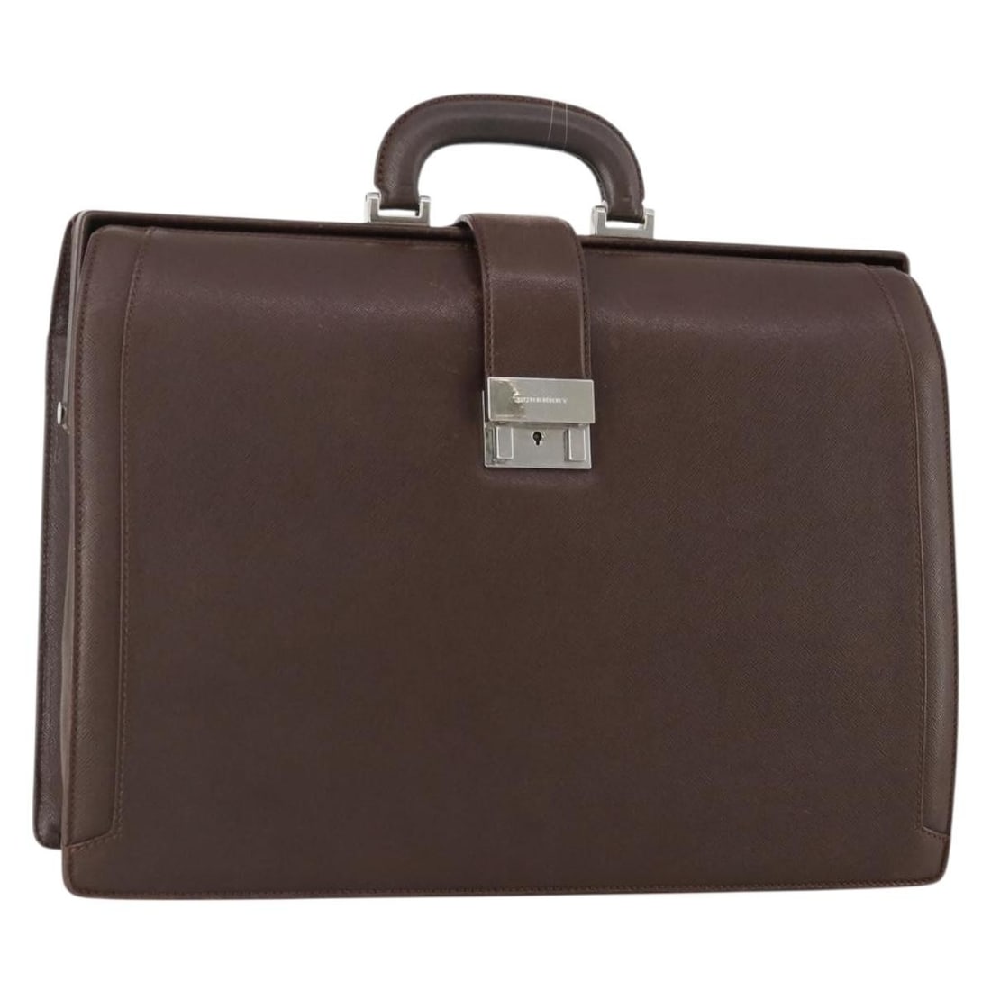 Burberry brown leather women business tote silver accents: Burberry brown leather women business tote silver accents This Burberry business bag is crafted from brown leather with silver-tone accents, designed for women. The bag features a spacious interior an