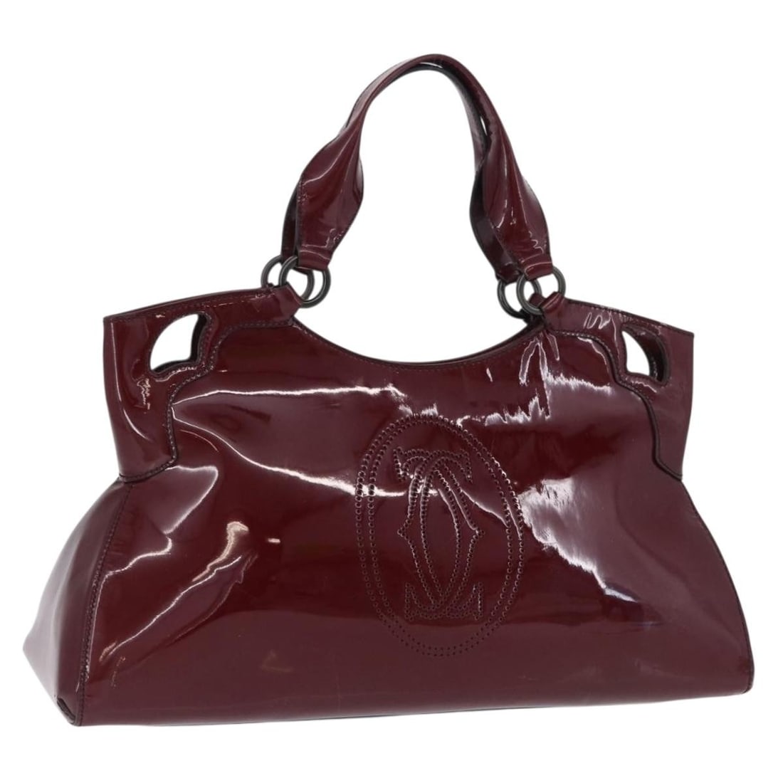 Cartier Marcello Must Line Bordeaux Patent Handbag: Cartier Marcello Must Line Bordeaux Patent Handbag A Cartier Must Line Marcello hand bag in Bordeaux, made in Italy. It is described as having an enamel material and a patent finish, with a structured