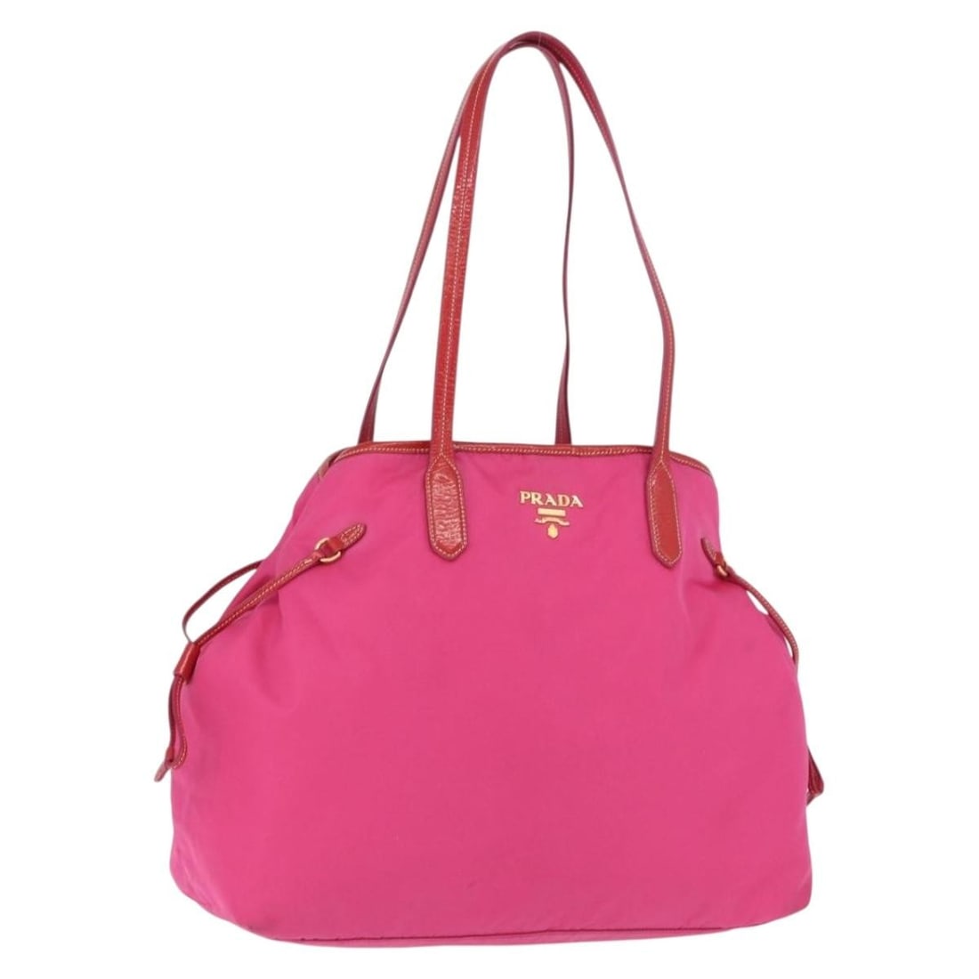 PRADA Nylon Tote Handbag Gold Pink with Guarantee Card: PRADA Nylon Tote Handbag Gold Pink with Guarantee Card A PRADA nylon tote bag in gold and pink, made in Italy. It comes with a guarantee card and features a spacious tote silhouette with a handle drop