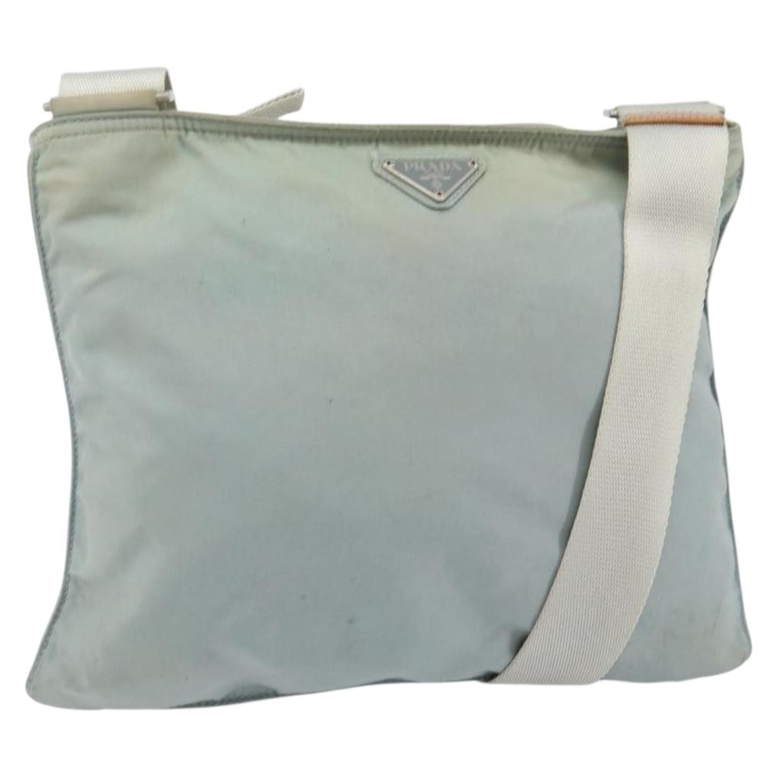 Prada Light Blue Silver Nylon Shoulder Bag Italy: Prada Light Blue Silver Nylon Shoulder Bag Italy This PRADA shoulder bag is crafted from nylon in a light blue and silver color combination. Designed for women, it features an adjustable shoulder stra