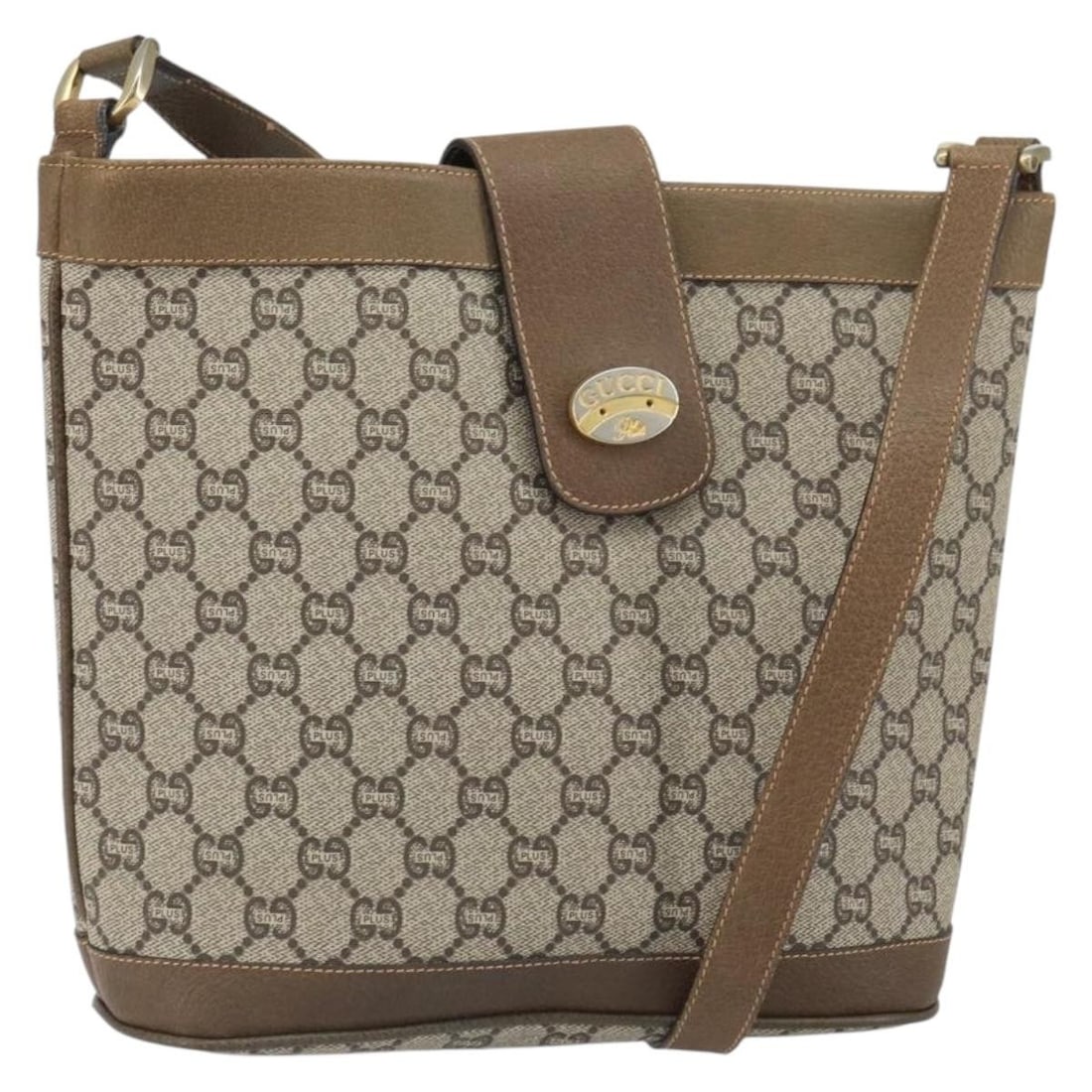 Gucci GG Supreme Beige PVC Shoulder Bag Gold Tone Italy: Gucci GG Supreme Beige PVC Shoulder Bag Gold Tone Italy This Gucci GG Plus Supreme shoulder bag features a beige and gold exterior crafted from PVC leather and GG canvas. The bag is designed with a st
