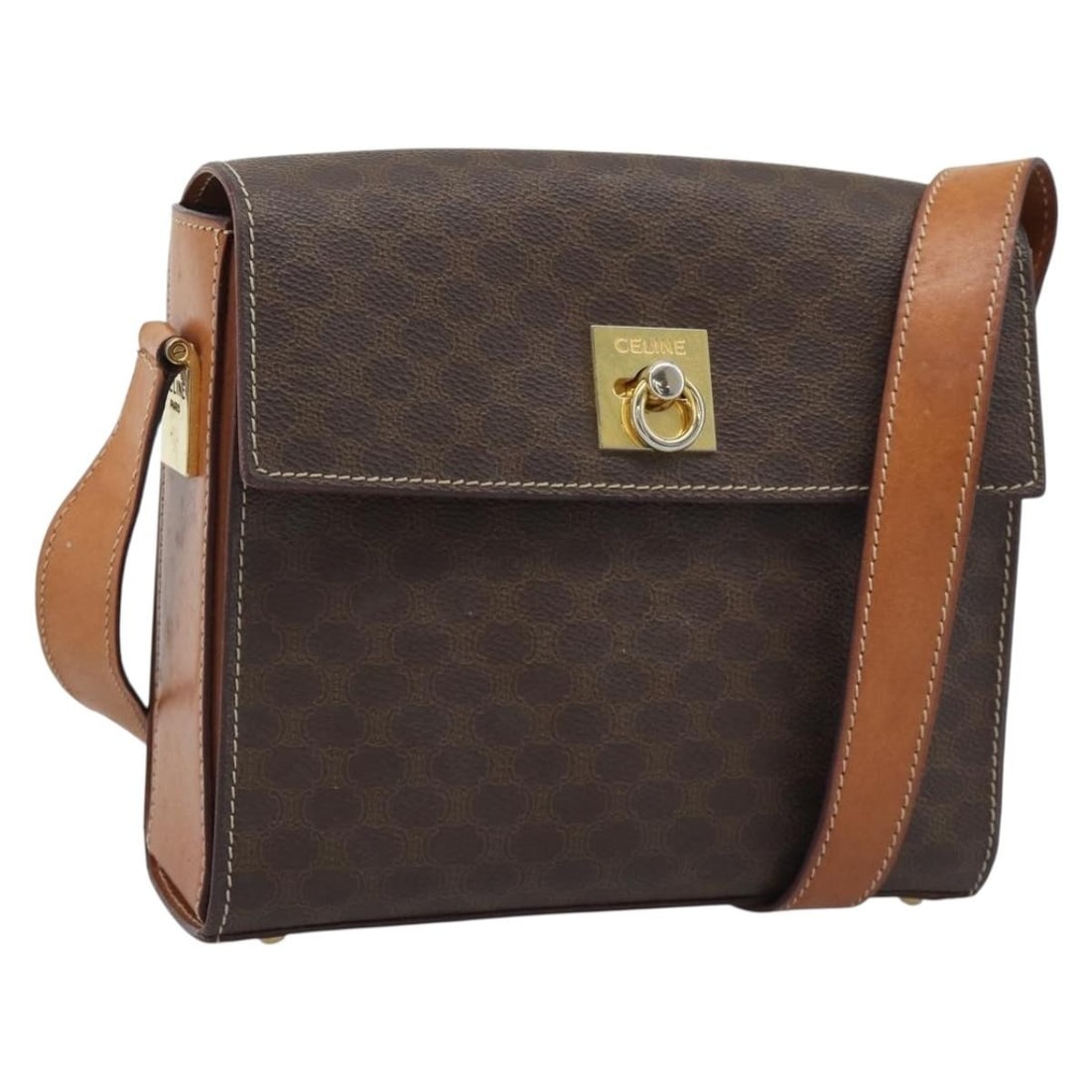 CELINE Macadam PVC Leather Shoulder Bag Brown Gold Tone: CELINE Macadam PVC Leather Shoulder Bag Brown Gold Tone A CELINE Macadam shoulder bag in brown with gold-tone accents, made from PVC leather and Macadam canvas. It features a shoulder bag style and wa