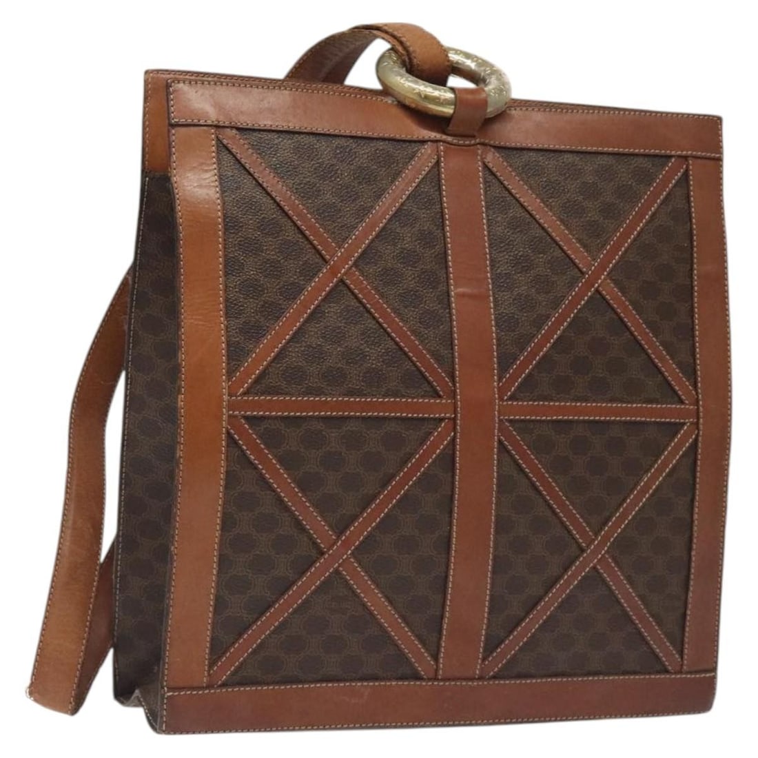 Celine Macadam Brown PVC and Leather Shoulder Bag Gold Accents Italy: Celine Macadam Brown PVC and Leather Shoulder Bag Gold Accents Italy This CELINE Macadam shoulder bag is crafted from brown and gold PVC leather and Macadam canvas. Designed for women, it features a c