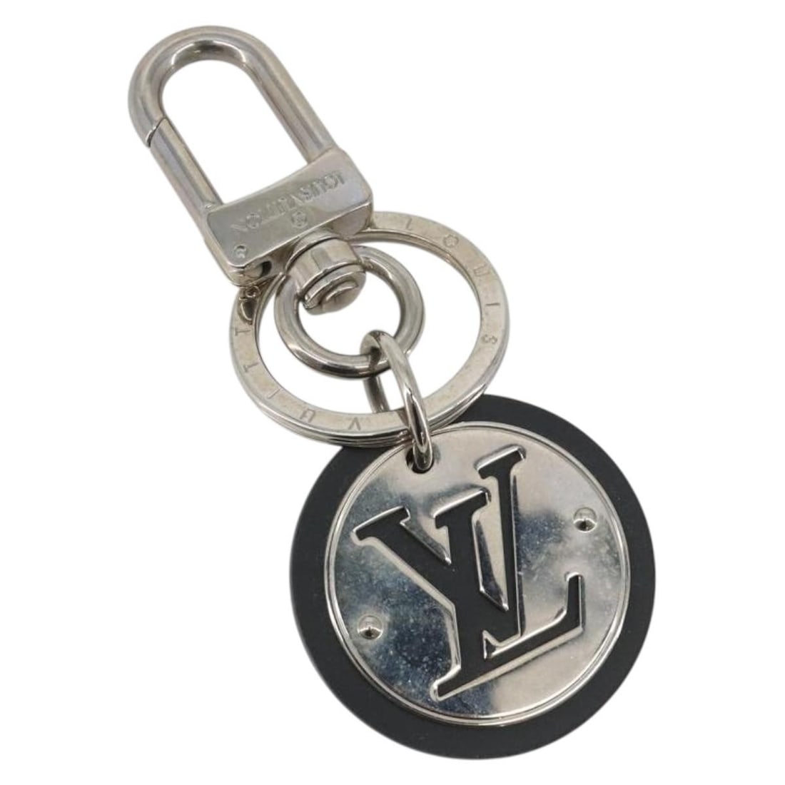 Louis Vuitton M67362 LV Circle Metal Key Holder Silver: Louis Vuitton M67362 LV Circle Metal Key Holder Silver Louis Vuitton LV Circle key holder in silver metal, made in Italy. The item is identified as product no. M67362 and is intended for women. It mea