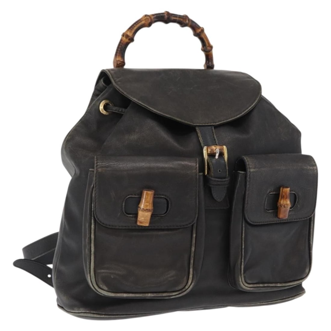 Black Leather Bamboo Backpack by Gucci Model 003 2058 0016 Gold Accents: Black Leather Bamboo Backpack by Gucci Model 003 2058 0016 Gold Accents This is a Gucci Bamboo backpack crafted from black leather with gold-tone accents. The backpack features a bamboo handle, adjust
