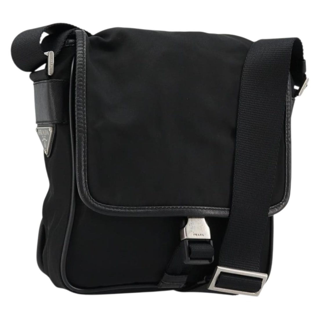PRADA Black Nylon Leather Shoulder Bag Silver Tone Italy: PRADA Black Nylon Leather Shoulder Bag Silver Tone Italy This PRADA shoulder bag is crafted from black nylon with silver-tone accents and leather details. Designed for women, it features a practical s