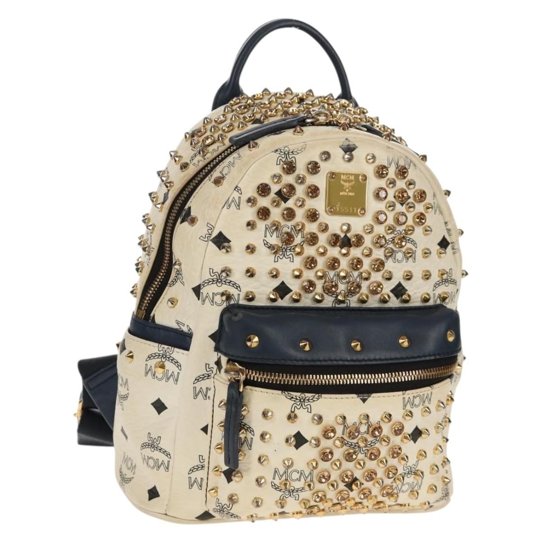 MCM Vicetos White Gold PVC Leather Backpack: MCM Vicetos White Gold PVC Leather Backpack MCM Vicetos logogram backpack in white and gold PVC leather, made in Korea. This women's backpack measures approximately 21 x 25 x 10 cm (8.3 x 9.8 x 3.9 in