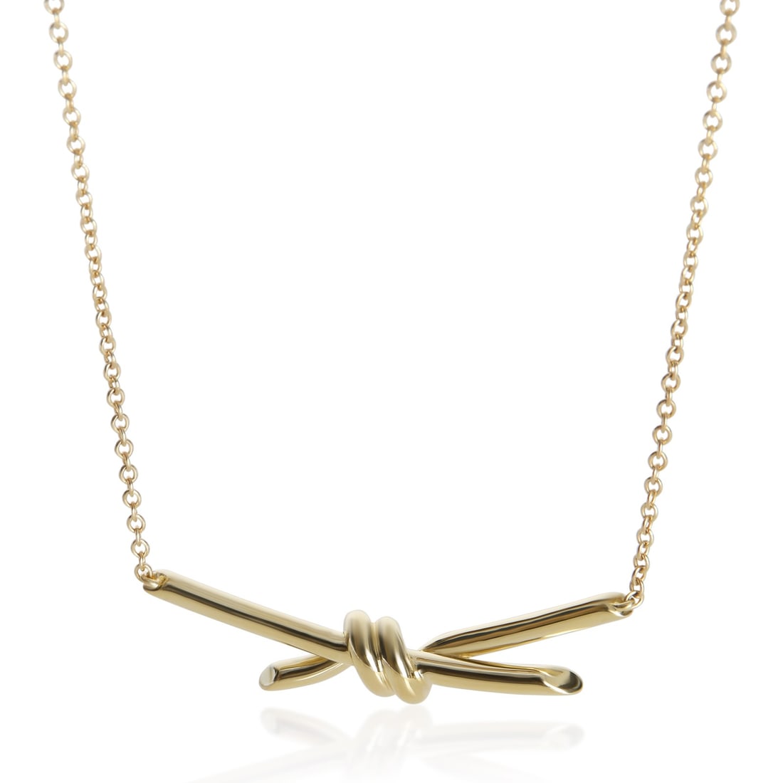 Tiffany & Co. Knot 18k Yellow Gold Necklace 17 In Box Pouch: Tiffany & Co. Knot 18k Yellow Gold Necklace 17 In Box Pouch A pre-owned women's necklace from the Knot collection, crafted in 18k yellow gold. It features a spring ring clasp and measures 17 in in len