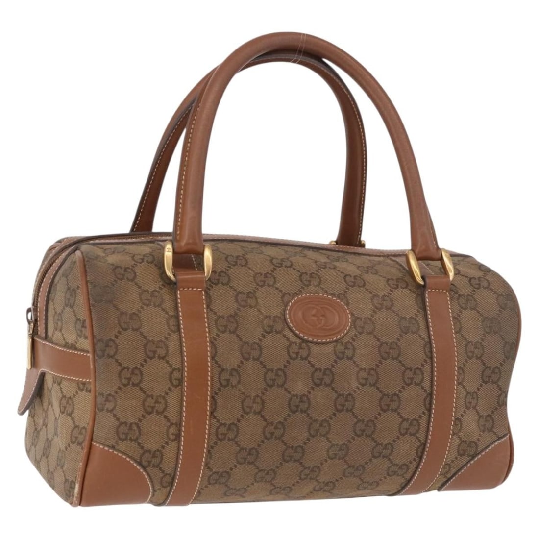 Gucci Boston Bag in Beige Gold GG Canvas: Gucci Boston Bag in Beige Gold GG Canvas Authentic Gucci Boston bag in beige and gold GG canvas, made in Italy. This women's handbag has a structured Boston silhouette with dual handles. Please note t