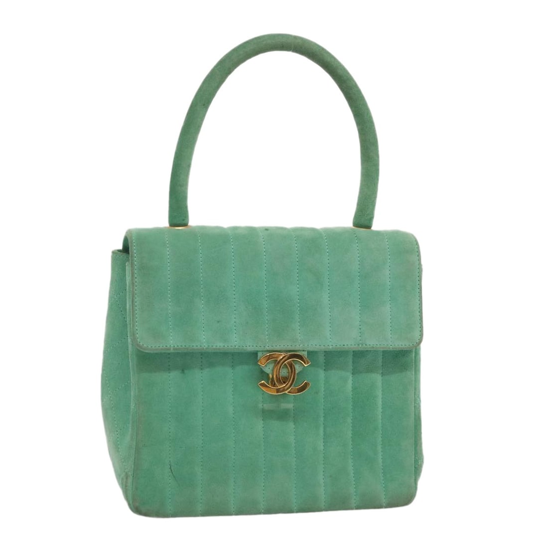 Green Suede Hand Bag CHANEL CC with Guarantee Card: Green Suede Hand Bag CHANEL CC with Guarantee Card A CHANEL hand bag in green suede, made in France. It comes with a guarantee card and has a heavily used condition with visible rubbing, stains, sligh