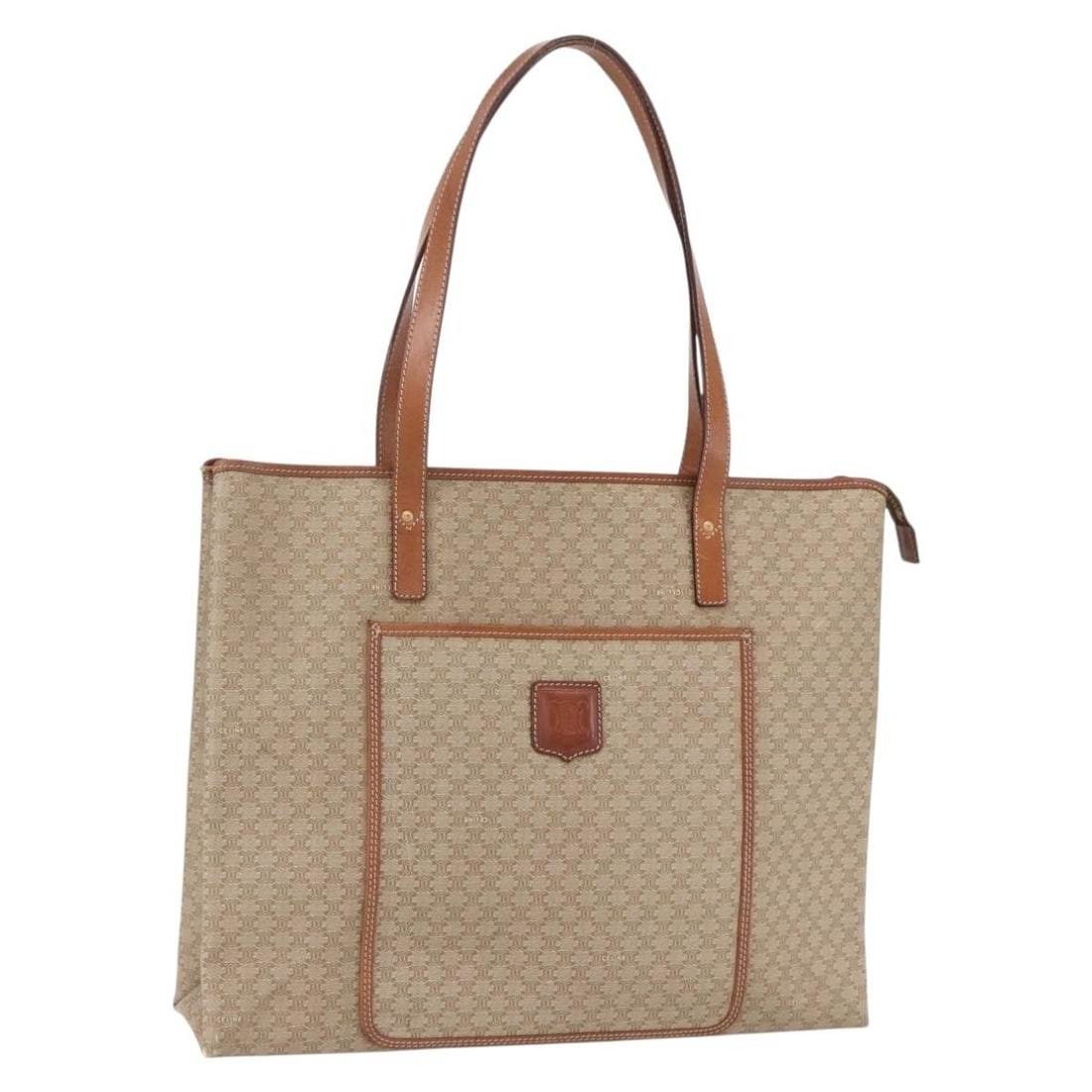 CELINE Macadam Beige PVC Tote Bag Made in Italy: CELINE Macadam Beige PVC Tote Bag Made in Italy This CELINE Macadam Canvas Tote Bag is a stylish and practical accessory made from durable PVC leather with a classic beige finish. Originating from Ita