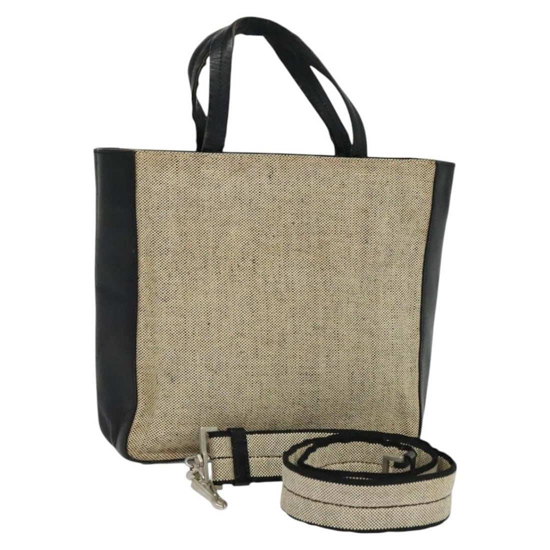 PRADA beige canvas handbag with shoulder strap Italy: PRADA beige canvas handbag with shoulder strap Italy This PRADA 2-way hand bag is crafted from beige canvas and offers versatility with both top handles and a detachable shoulder strap. Made in Italy,