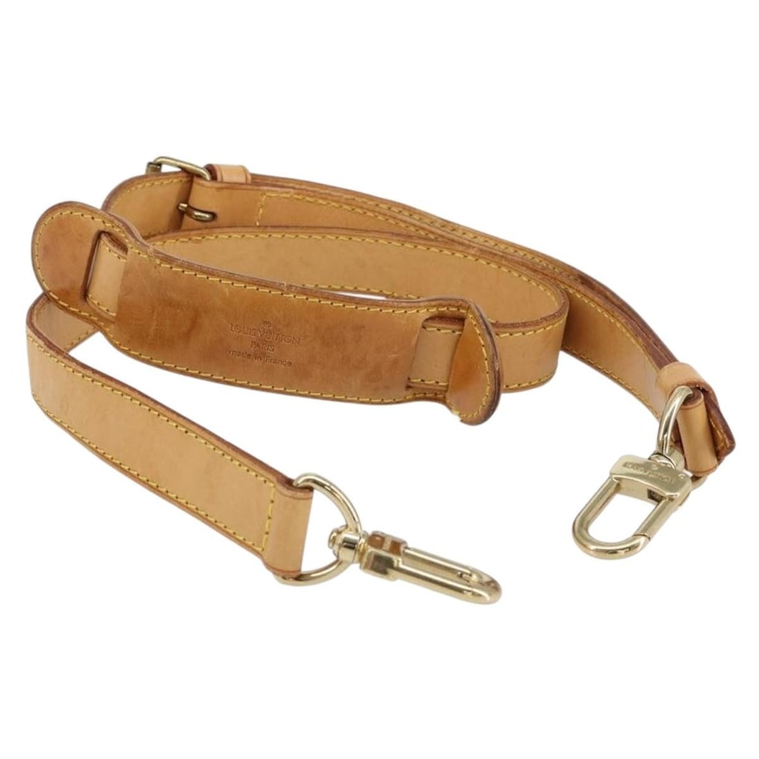 Louis Vuitton beige leather shoulder strap 40.2 to 47.2 France: Louis Vuitton beige leather shoulder strap 40.2 to 47.2 France Authentic Louis Vuitton shoulder strap in beige leather. This heavily used strap shows visible wear including rubbing, staining, sun burn