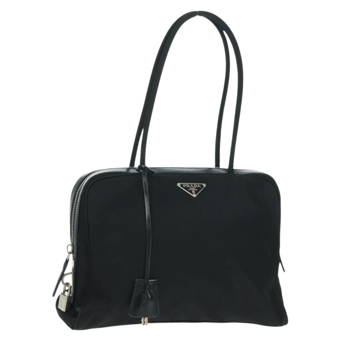 Prada Black Nylon Handbag with Leather Trim Padlock and Keys: Prada Black Nylon Handbag with Leather Trim Padlock and Keys PRADA hand bag in black with silver-tone accents, made of nylon with leather details. It includes a padlock, two keys, and a clochette, and