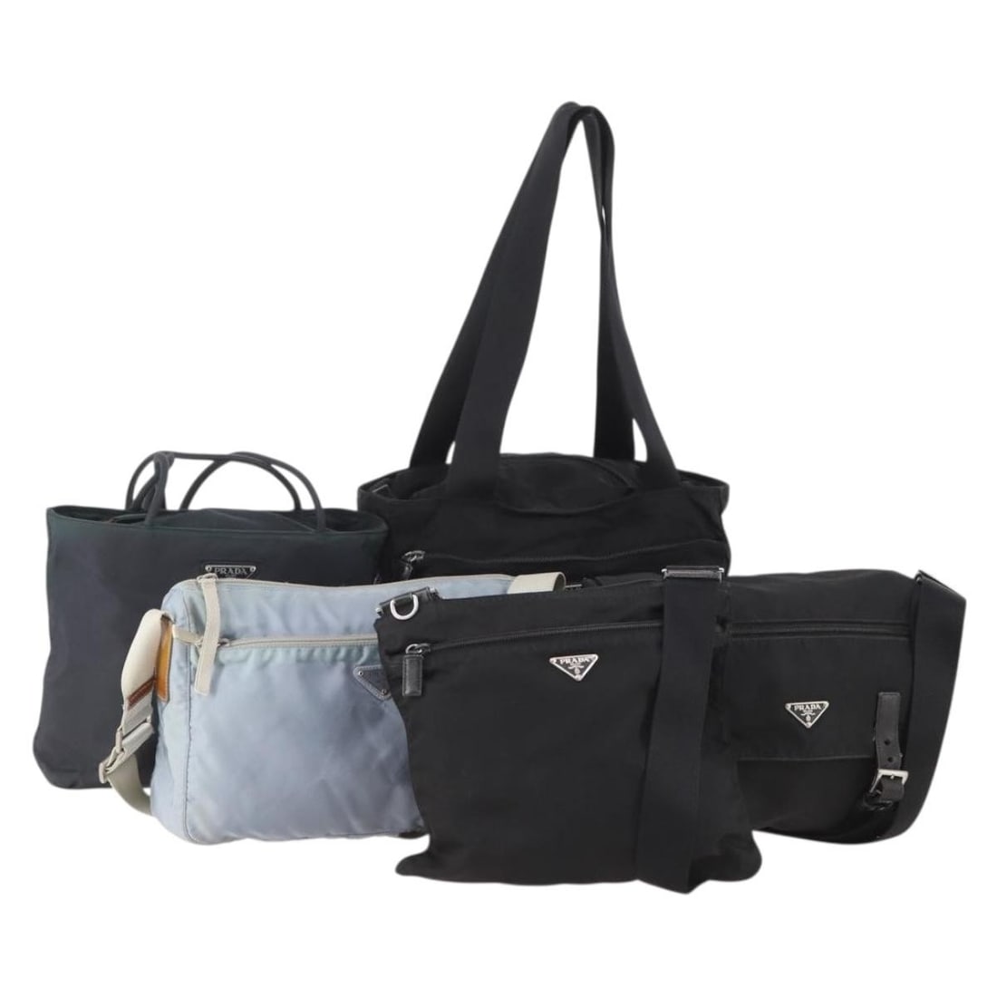 Set of 5 Prada nylon shoulder bags black light blue navy: Set of 5 Prada nylon shoulder bags black light blue navy Set of Prada women's shoulder bags in nylon with a black, light blue, and navy color palette. Made in Italy. This special set sale includes onl
