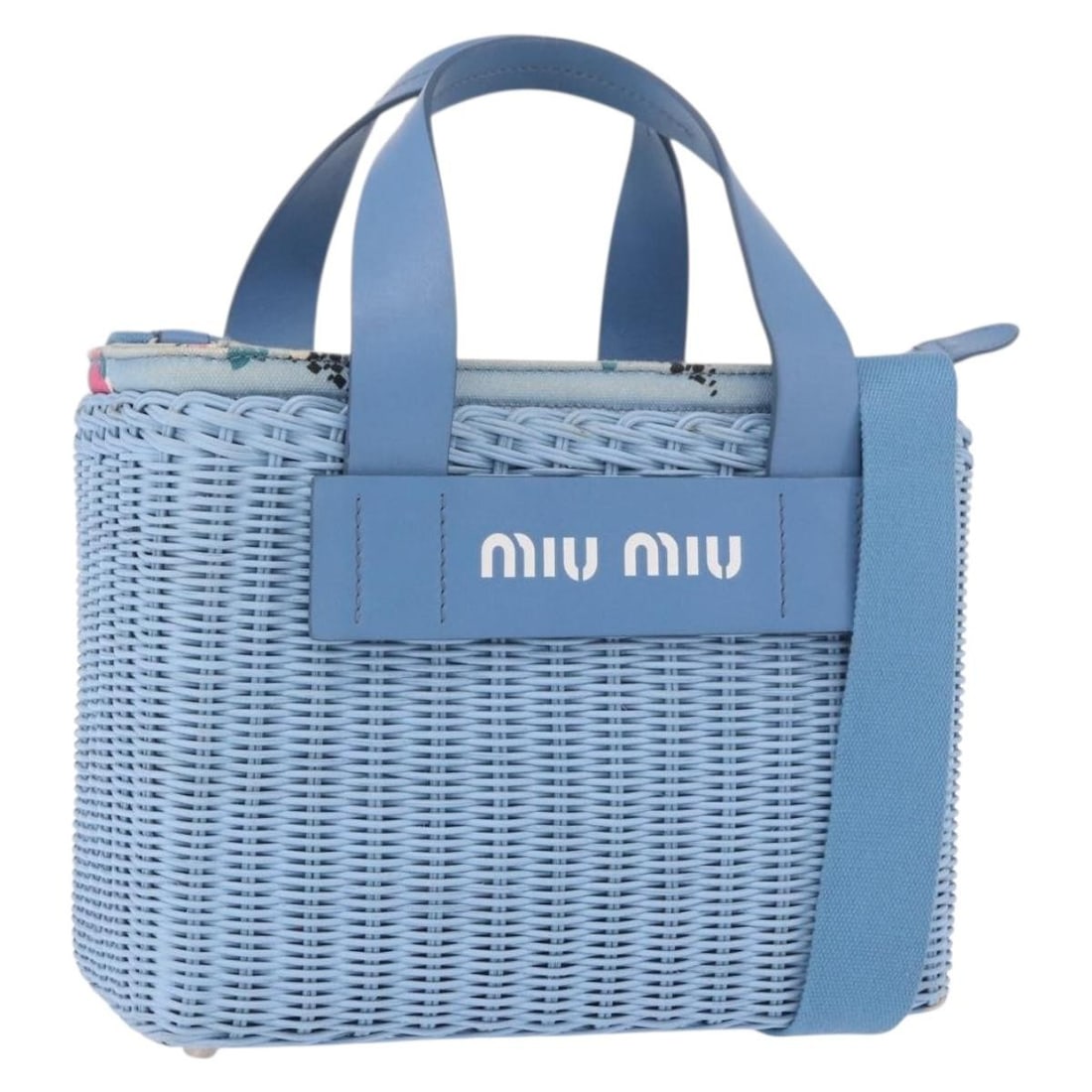 Miu Miu 2way Wood Handbag Light Blue with Silver Tone Strap: Miu Miu 2way Wood Handbag Light Blue with Silver Tone Strap This Miu Miu 2-way handbag is crafted in light blue and silver with a wood exterior. It comes with a shoulder strap and guarantee card, and 