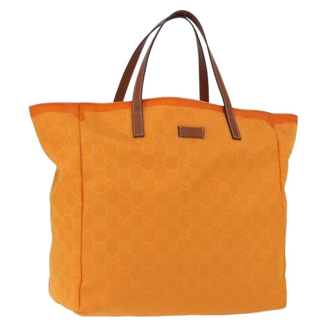 Gucci 282439 Orange Nylon GG Canvas Tote: Gucci 282439 Orange Nylon GG Canvas Tote Orange Gucci tote bag in nylon with GG canvas trim. This women's bag is made in Italy and features a structured tote silhouette with top handles. Please note t