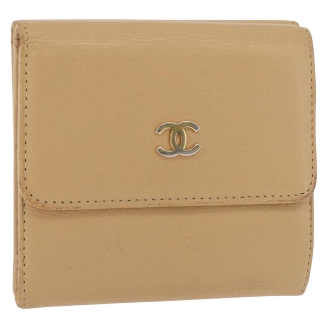 CHANEL Beige Leather Trifold Wallet with Gold CC France: CHANEL Beige Leather Trifold Wallet with Gold CC France CHANEL trifold wallet in beige and gold leather, made in France. This women's wallet measures approximately 10 cm x 9 cm x 2 cm (3.9 x 3.5 x 0.8