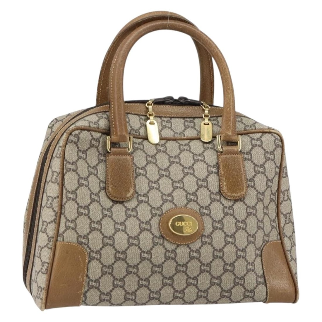 Gucci GG Plus Supreme PVC Boston Bag Beige Gold 160615: Gucci GG Plus Supreme PVC Boston Bag Beige Gold 160615 A Gucci Boston bag in beige and gold with PVC leather and GG canvas exterior. Made in Italy, this women's bag features a structured Boston bag st