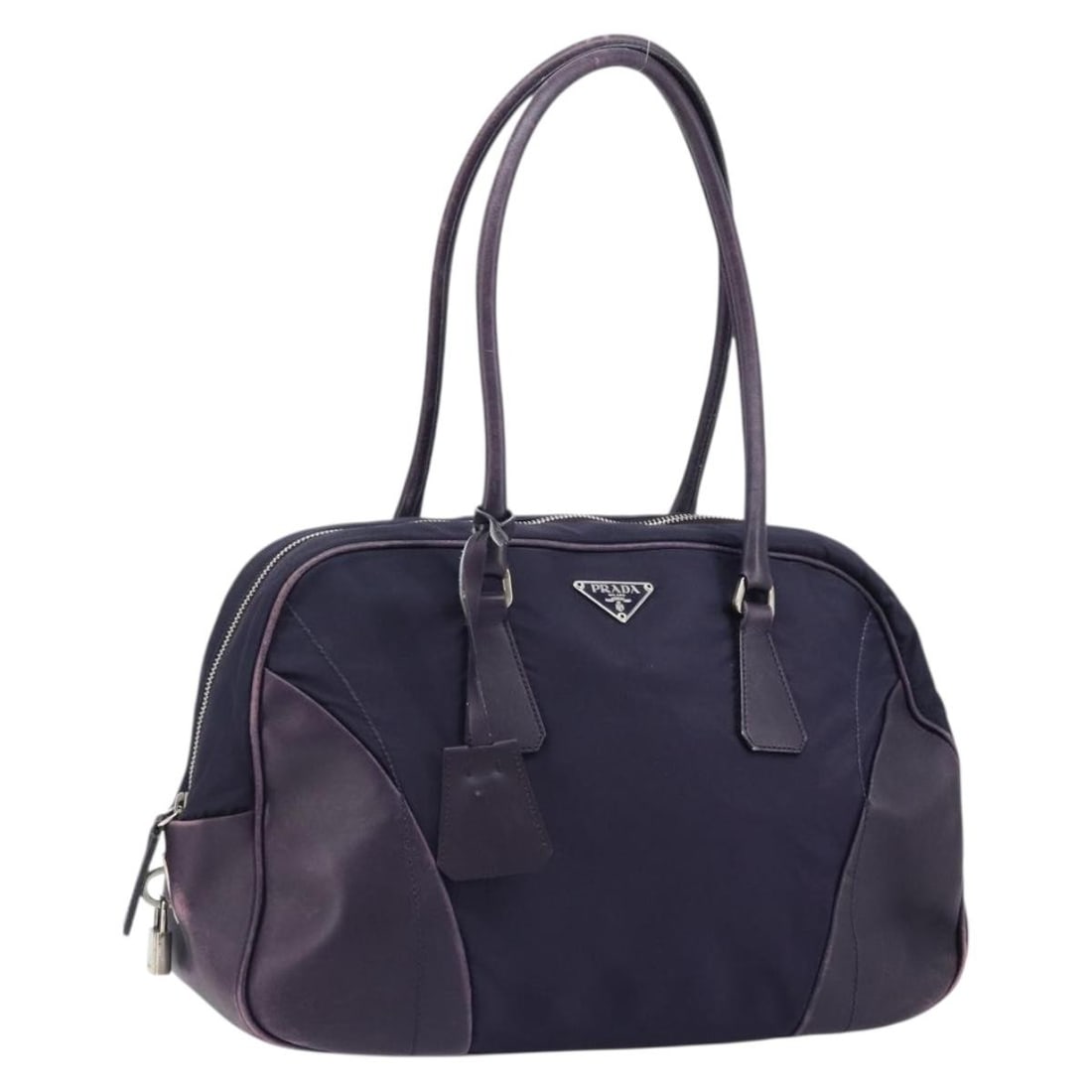 PRADA Purple Silver Nylon Boston Bag with Padlock Keys Clochette: PRADA Purple Silver Nylon Boston Bag with Padlock Keys Clochette This Prada Boston Bag is crafted from nylon in a purple and silver color combination. It is a women's bag made in Italy and comes with 