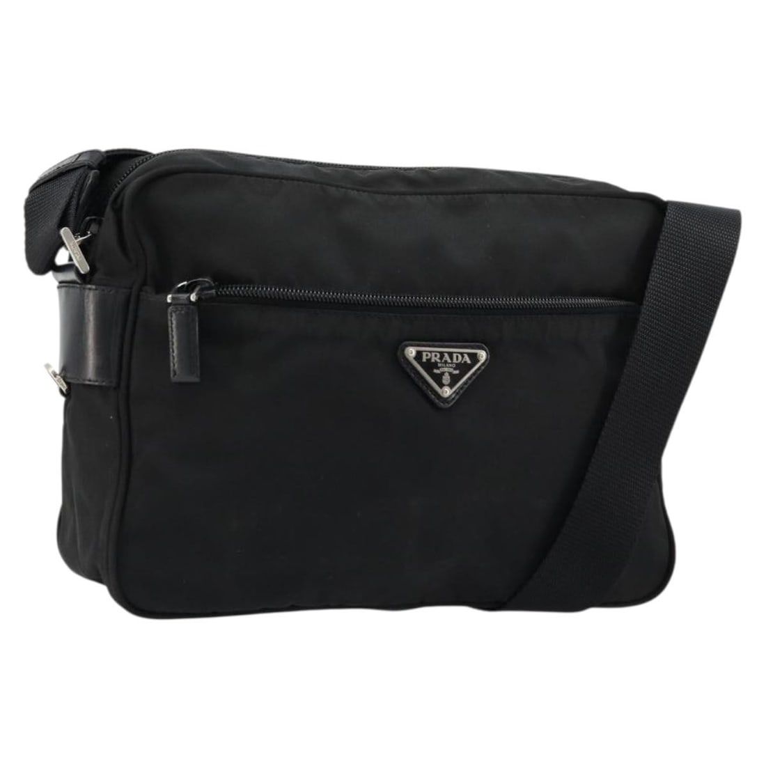 Prada Black Silver Nylon Women Shoulder Bag Italy: Prada Black Silver Nylon Women Shoulder Bag Italy This PRADA shoulder bag is crafted from black nylon with silver-tone accents, offering a practical and stylish accessory. Designed for women, it featu