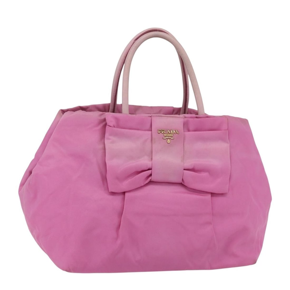 Prada Pink Gold Nylon Hand Bag Made in Italy: Prada Pink Gold Nylon Hand Bag Made in Italy A PRADA hand bag in pink and gold nylon, made in Italy. The bag measures approximately W28 x H22 x D16 cm, with a handle drop of approximately 12 cm. It is